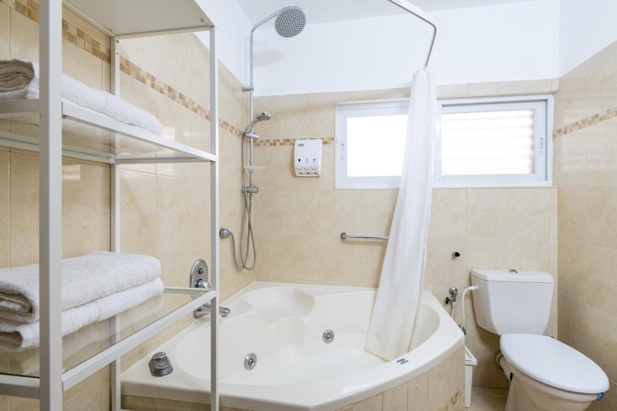Yagen Boutique Apartments Haifa Habitación foto